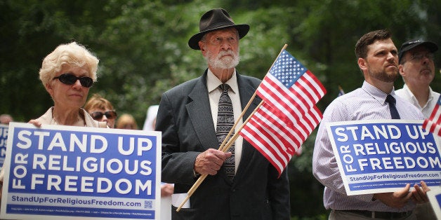 CHICAGO, IL - JUNE 30: Religious freedom supporters hold a rally to praise the Supreme Court's decision in the Hobby Lobby,