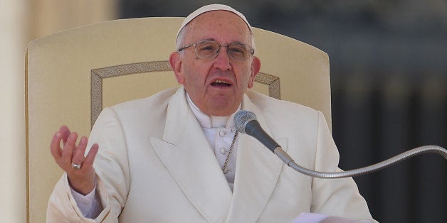 Pope Francis addresses the crowd during his weekly general audience at St Peter's square on March 2, 2016 at the Vatican. / A