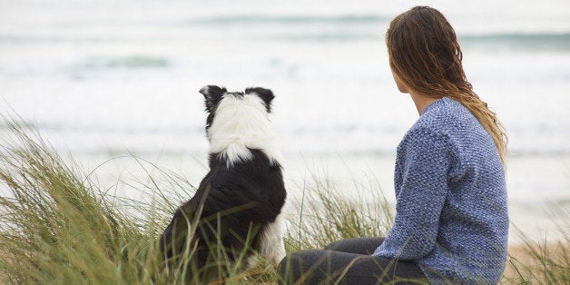 Sitting in the sand dunes watching the sea.