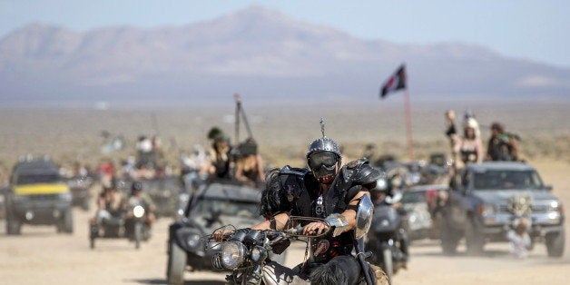 An enthusiast rides his customized motorcycle during the Wasteland Weekend event in California City, California September 26,