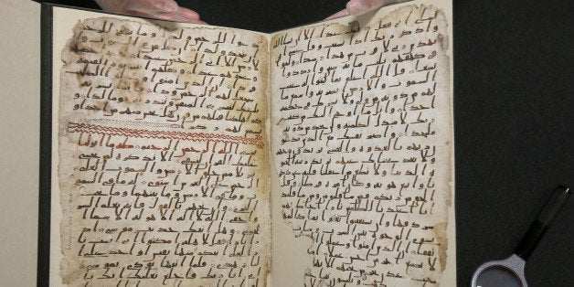 A fragment of a Koran manuscript is seen in the library at the University of Birmingham in Britain July 22, 2015. A British university said on Wednesday that fragments of a Koran manuscript found in its library were from one of the oldest surviving copies of the Islamic text in the world, possibly written by someone who might have known Prophet Mohammad. Radiocarbon dating indicated that the parchment folios held by the University of Birmingham in central England were at least 1,370 years old, which would make them one of the earliest written forms of the Islamic holy book in existence. REUTERS/Peter Nicholls