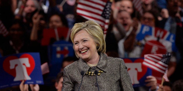 Democratic U.S. presidential candidate and former U.S. Secretary of State Hillary Clinton smiles as she speaks to supporters during her five state primary night rally held in Philadelphia, Pennsylvania , U.S., April 26, 2016. REUTERS/Charles Mostoller