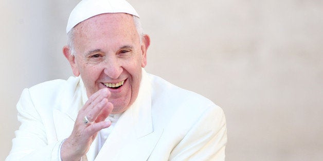 VATICAN CITY, VATICAN - MARCH 12: Pope Francis waves to the faithful as he arrives in St. Peter's Square for a Jubilee Audie