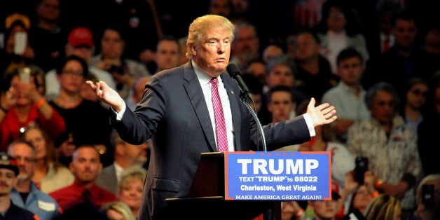 Republican U.S. presidential candidate Donald Trump speaks to supporters in Charleston, West Virginia, U.S. May 5, 2016. REUTERS/Chris Tilley