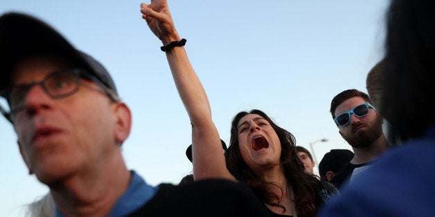 VALLEJO, CA - MAY 18: Supporters cheer as Democratic presidential candidate Sen. Bernie Sanders speaks at a campaign rally at Waterfront Park on May 18, 2016 in Vallejo, California. A day after winning the Oregon primary, Bernie Sanders is campaigning in California ahead of the state's presidential primary on June 7. (Photo by Justin Sullivan/Getty Images)