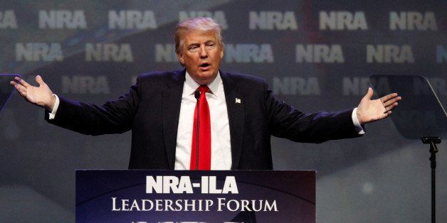 Republican presidential candidate Donald Trump addresses members of the National Rifle Association during their NRA-ILA Leadership Forum during at their annual meeting in Louisville, Kentucky, May 20, 2016. REUTERS/John Sommers II