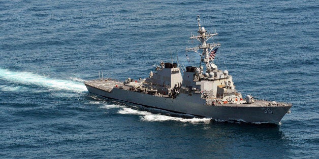 The guided-missile destroyer USS John S. McCain sails in formation during exercise Foal Eagle 2013 in waters west of the Kore
