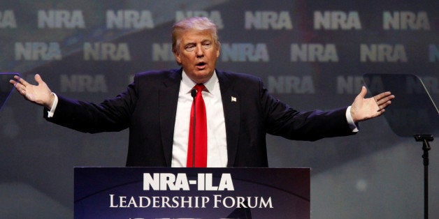 Republican presidential candidate Donald Trump addresses members of the National Rifle Association during their NRA-ILA Leade