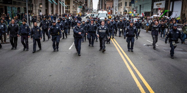 MIDTOWN MANHATTAN, NEW YORK CITY, NEW YORK, UNITED STATES - 2016/03/19: Policemen flooded the street during the anti-Trump rally. Thousands marched during the Anti-Trump Rally through the streets in Manhattan and were met with pepper spray and there were also three photographers arrested. (Photo by Michael Nigro/Pacific Press/LightRocket via Getty Images)