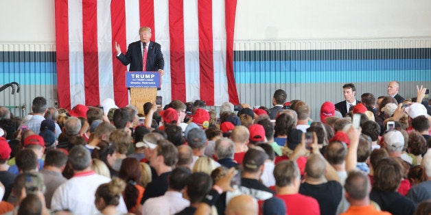 U.S. Republican presidential candidate Donald Trump speaks at a campaign rally at Werner Enterprises Hangar in Omaha, Nebrask