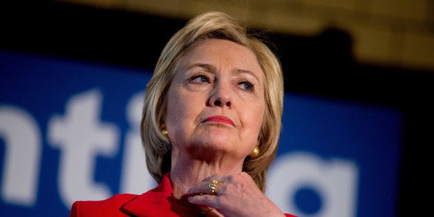 In this May 16, 2016 photo, Democratic presidential candidate Hillary Clinton waits to speak at a get out the vote event at La Gala in Bowling Green, Ky. Hillary Clinton has a message for Donald Trump: Bring it on. As Clinton's path to the Democratic nomination seems all-but-assured, friends, aides and supporters describe a candidate who is not only prepared to tune out Trump's increasingly direct attacks on her husband's personal indiscretions but believes they will eventually benefit her presidential aspirations. (AP Photo/Andrew Harnik)