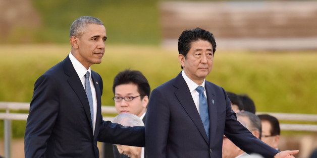 HIROSHIMA, JAPAN - MAY 27: U.S. President Barack Obama (L) and Japanese Prime Minister Shinzo Abe (R) visit the Hiroshima Peace Memorial Park on May 27, 2016 in Hiroshima, Japan. It is the first time U.S. President makes an official visit to Hiroshima, the site where the atomic bomb was dropped in the end of World War II on August 6, 1945. (Photo by Atsushi Tomura/Getty Images)