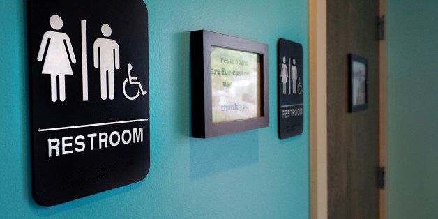 DURHAM, NC - MAY 10: Unisex signs hang outside bathrooms at Toast Paninoteca on May 10, 2016 in Durham, North Carolina. Debate over transgender bathroom access spreads nationwide as the U.S. Department of Justice countersues North Carolina Governor Pat McCrory from enforcing the provisions of House Bill 2 (HB2) that dictate what bathrooms transgender individuals can use. (Photo by Sara D. Davis/Getty Images)