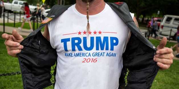 UNITED STATES - MAY 29 - A biker shows off his shirt in support of Republican presidential candidate Donald Trump, on the National Mall during the Rolling Thunder Inc. XXIX 'Freedom Ride,' on Sunday, May 29, 2016 in Washington. The annual bike ride which occurs over Memorial Day weekend, honors U.S. prisoners of war and missing-in-action troops, as well as raises awareness about veterans issues. (Photo By Al Drago/CQ Roll Call)