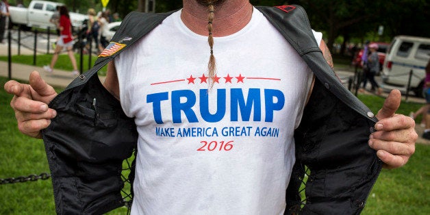 UNITED STATES - MAY 29 - A biker shows off his shirt in support of Republican presidential candidate Donald Trump, on the National Mall during the Rolling Thunder Inc. XXIX 'Freedom Ride,' on Sunday, May 29, 2016 in Washington. The annual bike ride which occurs over Memorial Day weekend, honors U.S. prisoners of war and missing-in-action troops, as well as raises awareness about veterans issues. (Photo By Al Drago/CQ Roll Call)