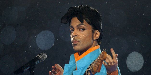 Prince performs during the halftime show of the NFL's Super Bowl XLI football game between the Chicago Bears and the Indianapolis Colts in Miami, Florida, U.S. February 4, 2007. REUTERS/Mike Blake/File Photo TPX IMAGES OF THE DAY 