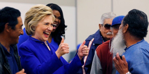 U.S. Democratic presidential candidate Hillary Clinton gestures during a campaign stop at a community center in Compton, California, United States June 6, 2016. REUTERS/Mike Blake 