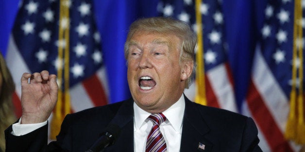 Republican U.S. presidential candidate Donald Trump speaks at a campaign event on the day several states held presidential primaries, including California, at the Trump National Golf Club Westchester in Briarcliff Manor, New York, U.S., June 7, 2016 REUTERS/Carlo Allegri