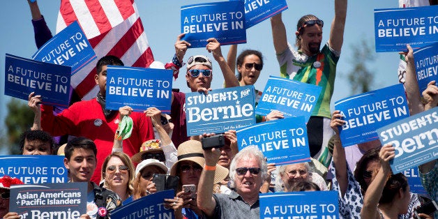 Supporters of Democratic presidential candidate Sen. Bernie Sanders, I-Vt., cheer during a campaign rally at the Cubberley Community Center on Wednesday, June 1, 2016, in Palo Alto, Calif. (AP Photo/Noah Berger)