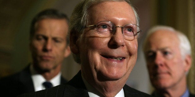 WASHINGTON, DC - MARCH 08: U.S. Senate Majority Leader Sen. Mitch McConnell (R-KY) (2nd L) speaks as (L-R) Sen. John Thune (
