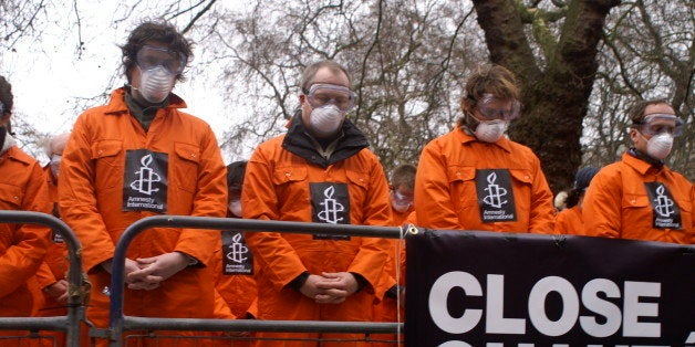 Amnesty International demonstrates in front of the US Embassy in London on 11 January 2007 for the closure of the US detention centre at Guantanamo Bay.