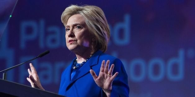 US Democratic presidential candidate Hillary Clinton addresses the Planned Parenthood Action Fund in Washington, DC, on June 10, 2016. / AFP / CHRIS KLEPONIS (Photo credit should read CHRIS KLEPONIS/AFP/Getty Images)