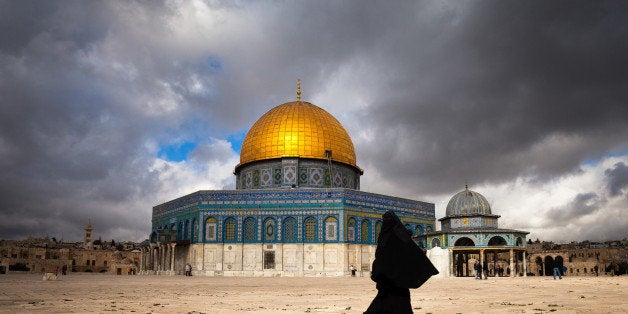 Muslim woman in a black burqa walking by the Dome of the Rock in Jerusalem.The Dome of the Rock is a shrine located on the Temple Mount in the Old City of Jerusalem. It was initially completed in 691 CE at the order of Umayyad Caliph Abd al-Malik during the Second Fitna. The Dome of the Rock is now one of the oldest works of Islamic architecture. It has been called 'Jerusalem's most recognizable landmark. The octagonal plan of the structure may have been influenced by the Byzantine Chapel of St Mary (also known as Kathisma and al-Qadismu) built between 451 and 458 on the road between Jerusalem and Bethlehem.The site's significance stems from religious traditions regarding the rock, known as the Foundation Stone, at its heart, which bears great significance for Jews, Christians and Muslims.