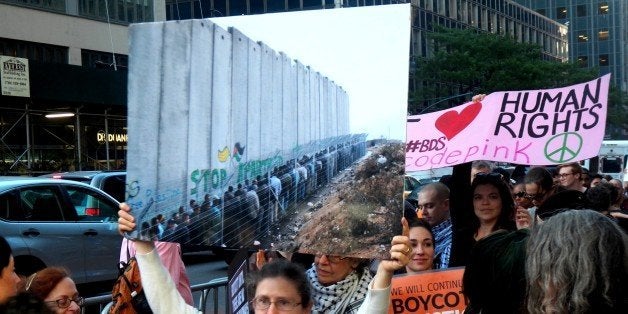 633 3RD AVENUE, NEW YORK NY USA, NEW YORK, UNITED STATES - 2016/06/09: Around 300 people protest outside Governor Andrew Cuomo's office in New York City. Palestinian human rights has reached a critic point as Gov. Cuomo just signed a McCarthyism executive order requiring state agencies to divest from organizations that support the Palestinian call to boycott companies profiting from, or cultural or academic institutions complicit in, Israel's oppression of the Palestinian people. Furthermore, the order requires the creation of a publicly available blacklist of all companies and institutions that support the movement.The protest organized by Adalah-NY, The New York Campaign for the Boycott of Israel, Jewish Voice for Peace-NY, and Jews Say No!. (Photo by Mark Apollo/Pacific Press/LightRocket via Getty Images)