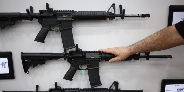 AR-15 rifles are displayed on the exhibit floor during the National Rifle Association (NRA) annual meeting in Louisville, Kentucky, U.S., on Friday, May 20, 2016. The nation's largest gun lobby, the NRA has been a political force in elections since at least 1994, turning out its supporters for candidates who back expanding access to guns. Photographer: Luke Sharrett/Bloomberg via Getty Images