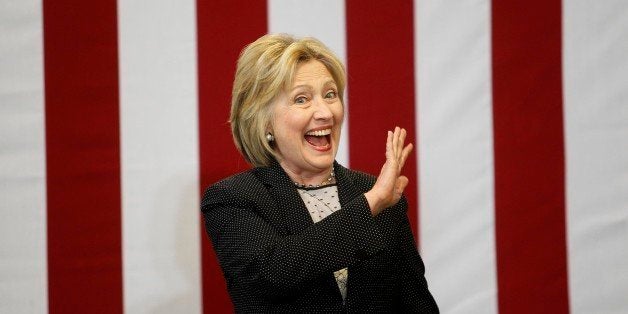 COLUMBUS, OH - JUNE 21: Presumptive Democratic presidential nominee Hillary Clinton waves to supporters on June 21, 2016 at the Construction Arts & Auto Technology building, Fort Hayes Metropolitan Education Center, in Columbus, Ohio. Clinton discussed her vision for a stronger America and her commitment to build an economy that she says will work for everyone. (Photo by J.D. Pooley/Getty Images)