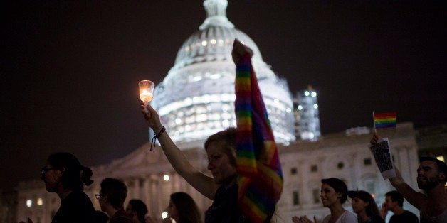 UNITED STATES - JUNE 15: Protesters supporting Sen. Chris Murphy's filibuster on gun laws march onto the grounds of the U.S.