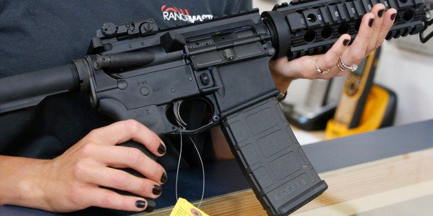 SPRINGVILLE, UT - JUNE 17: Courtney Manwaring holds an AR-15 semi-automatic gun at Action Target on June 17, 2016 in Springville, Utah. Semi-automatics are in the news again after the nightclub shooting in Orlando F;lord last week. (Photo by George Frey/Getty Images)