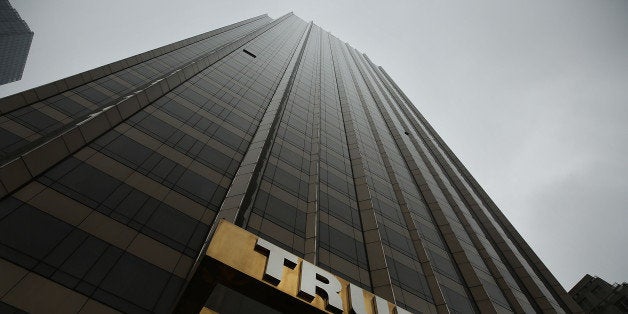 NEW YORK, NY - MAY 06: A Trump owned hotel stands in Manhattan as protesters rally in front of it on May 06, 2016 in New York City. The protesters, many of them Latino and Puerto Rican workers, are voicing their disapproval of Donald Trump's statements on the Puerto Rican debt crisis. While Trump said he doesn't believe the struggling unincorporated U.S. territory should have to pay all that it owes, he does not support a bailout for the island and instead would like to see the debt restructured. (Photo by Spencer Platt/Getty Images)