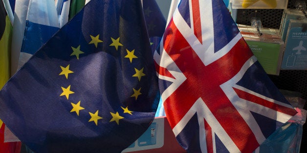 The British Union Flag, right, and the flag of the European Union (EU) sit on display in the gift shop at the Parlamentarium, the visitor center of the European Parliament, in Brussels, Belgium, on Friday, June 10, 2016. British public opinion is too close to call on whether the country should stay in the European Union, with many voters still undecided as interest groups and political leaders make their cases, according to two polls released this weekend. Photographer: Jasper Juinen/Bloomberg via Getty Images