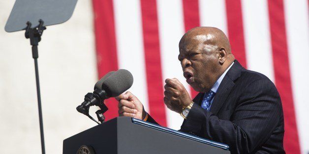US Representative John Lewis, Democrat of Georgia and one of the original Selma marchers, speaks during an event marking the 50th Anniversary of the Selma to Montgomery civil rights marches at the Edmund Pettus Bridge in Selma, Alabama, on March 7, 2015. US President Barack Obama rallied a new generation of Americans to the spirit of the civil rights struggle, warning their march for freedom 'is not yet finished.' In a forceful speech in Selma, Alabama on the 50th anniversary of the brutal repression of a peaceful protest, America's first black president denounced new attempts to restrict voting rights. AFP PHOTO/ SAUL LOEB (Photo credit should read SAUL LOEB/AFP/Getty Images)
