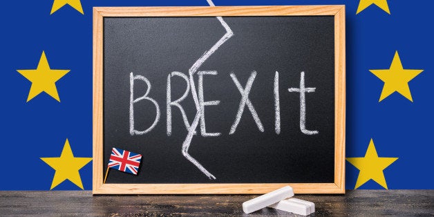 Brexit UK EU referendum concept cut Great Britain apart from rest of European union with flags and handwriting text written i