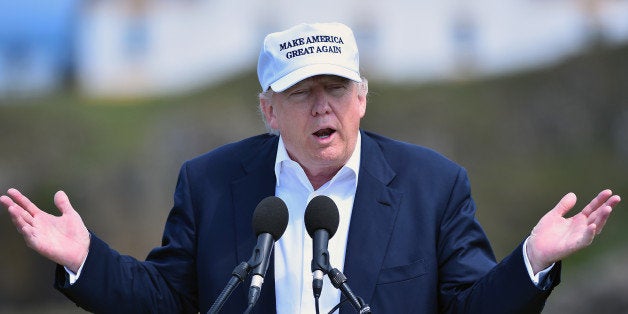 AYR, SCOTLAND - JUNE 24: Presumptive Republican nominee for US president Donald Trump gives a press conference on the 9th tee at his Trump Turnberry Resort on June 24, 2016 in Ayr, Scotland. Mr Trump arrived to officially open his golf resort which has undergone an eight month refurbishment as part of an investment thought to be worth in the region of two hundred million pounds. (Photo by Jeff J Mitchell/Getty Images)