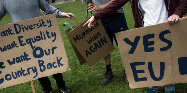LONDON, ENGLAND - JUNE 25: A small group of young people gather to protest on Parliament Square the day after the majority o
