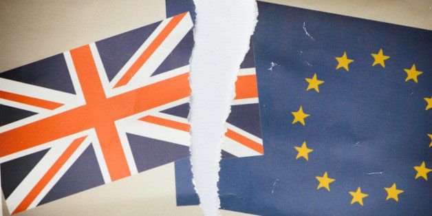 Image of a family snap photo showing the United Kingdom Union Jack and European Community flags - ripped in two as a divorce photo.