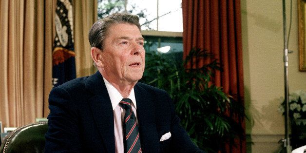 FILE - This Jan. 28, 1986 file picture shows U.S. President Ronald Reagan in the Oval Office of the White House after a televised address to the nation about the space shuttle Challenger explosion. (AP Photo/Dennis Cook)