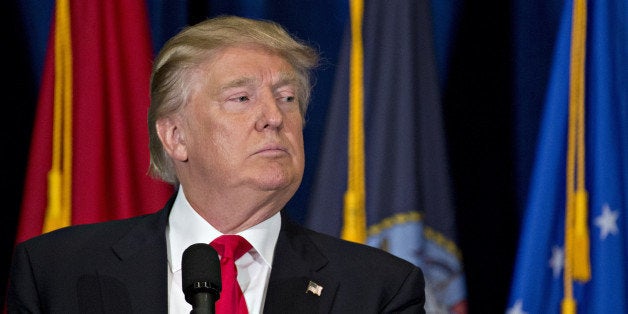 Donald Trump, presumptive 2016 Republican presidential nominee, pauses while speaking during a campaign event on veterans reform in Virginia Beach, Virginia, U.S., on Monday, July 11, 2016. Trump said he expects to choose his running mate for the GOP presidential ticket in the next three or four days and is leaning toward a political pick to balance out his outsider status, according to a Monday interview with the Washington Post. Photographer: Andrew Harrer/Bloomberg via Getty Images