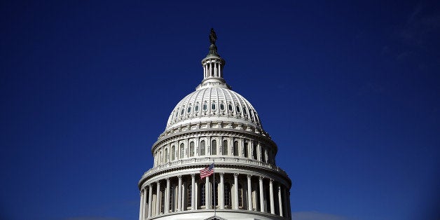 WASHINGTON, DC - SEPTEMBER 29: The United States Capitol building is seen as Congress remains gridlocked over legislation to continue funding the federal government September 29, 2013 in Washington, DC. The House of Representatives passed a continuing resolution with language to defund U.S. President Barack Obama's national health care plan yesterday, but Senate Majority Leader Harry Reid has indicated the U.S. Senate will not consider the legislation as passed by the House. (Photo by Win McNamee/Getty Images)