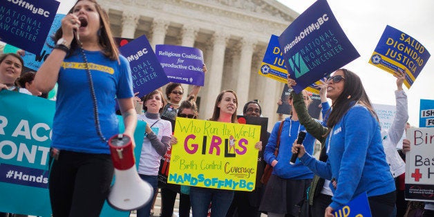 UNITED STATES - MARCH 23: Pro-choice demonstrators including Stephanie Castro, right, and Sandra Sanchez of the National Latina Institute for Reproductive Health, appear outside of the Supreme Court as arguments were heard in a case which religious organizations are challenging the Affordable Care Act's provision that requires employers to cover birth control in health care plans, March 23, 2016. (Photo By Tom Williams/CQ Roll Call)