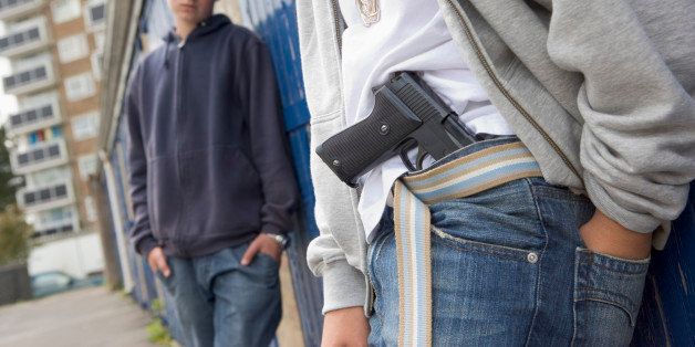 Teenage boys with gun
