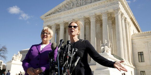 President and CEO of the Center for Reproductive Rights Nancy Northup (R) and President and CEO of Whole Women's Health Amy Hagstrom Miller speak to reporters on the steps of the U.S. Supreme Court after the court took up a major abortion case focusing on whether a Texas law that imposes strict regulations on abortion doctors and clinic buildings interferes with the constitutional right of a woman to end her pregnancy in Washington March 2, 2016. REUTERS/Kevin Lamarque 