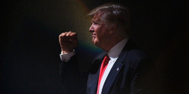 RALEIGH, NC - JULY 5: Presumptive Republican presidential nominee Donald Trump motions to the crowd while leaving the stage after a campaign event at the Duke Energy Center for the Performing Arts on July 5, 2016 in Raleigh, North Carolina. Earlier in the day Hillary Clinton campaigned in Charlotte, North Carolina with President Barack Obama. (Photo by Sara D. Davis/Getty Images)
