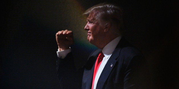 RALEIGH, NC - JULY 5: Presumptive Republican presidential nominee Donald Trump motions to the crowd while leaving the stage after a campaign event at the Duke Energy Center for the Performing Arts on July 5, 2016 in Raleigh, North Carolina. Earlier in the day Hillary Clinton campaigned in Charlotte, North Carolina with President Barack Obama. (Photo by Sara D. Davis/Getty Images) 