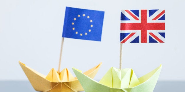 paper ship with british and european flag, concept shipment or free trade agreement and membership of eu, brexit