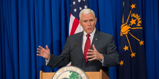 INDIANAPOLIS, IN - MARCH 31: Indiana Gov. Mike Pence speaks during a press conference March 31, 2015 at the Indiana State Library in Indianapolis, Indiana. Pence spoke about the state's controversial Religious Freedom Restoration Act which has been condemned by business leaders and Democrats. (Photo by Aaron P. Bernstein/Getty Images)