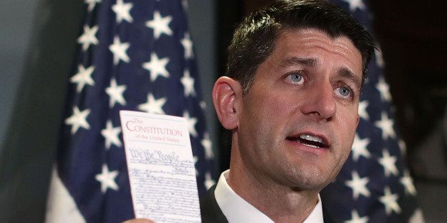WASHINGTON, DC - JULY 06: U.S. Speaker of the House Rep. Paul Ryan (R-WI) holds up a copy of the U.S. Constitution during a press briefing after a House Republican Conference meeting July 6, 2016 at the headquarters of Republican National Committee in Washington, DC. Speaker Ryan spoke on FBI's decision of not to recommend criminal charges against Hillary Clinton for using a private email server during her time as secretary of state. (Photo by Alex Wong/Getty Images)